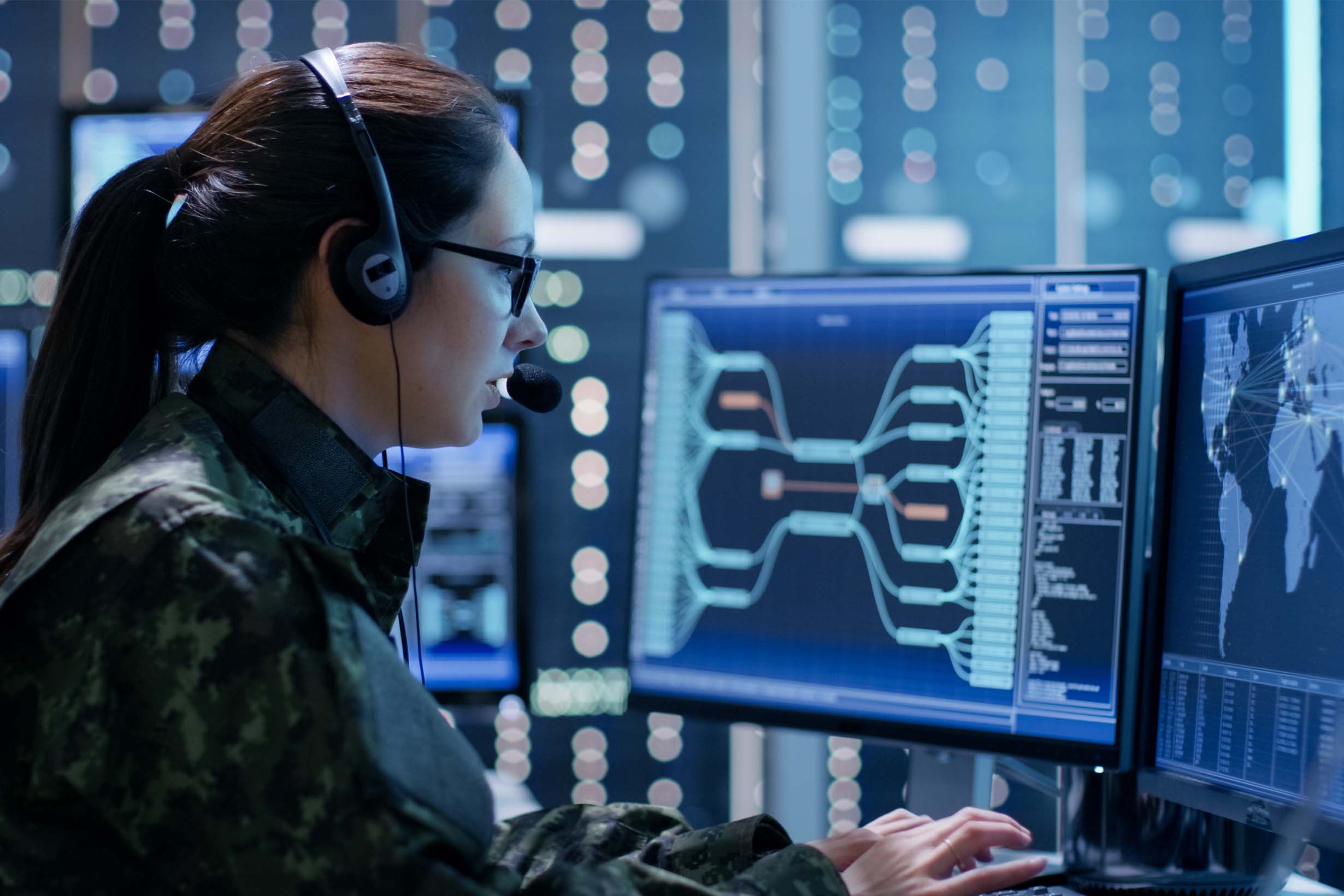 Woman on computer with sensitive data