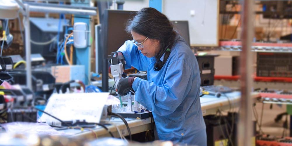 A Trenton Systems employee works on a Trenton computing solution