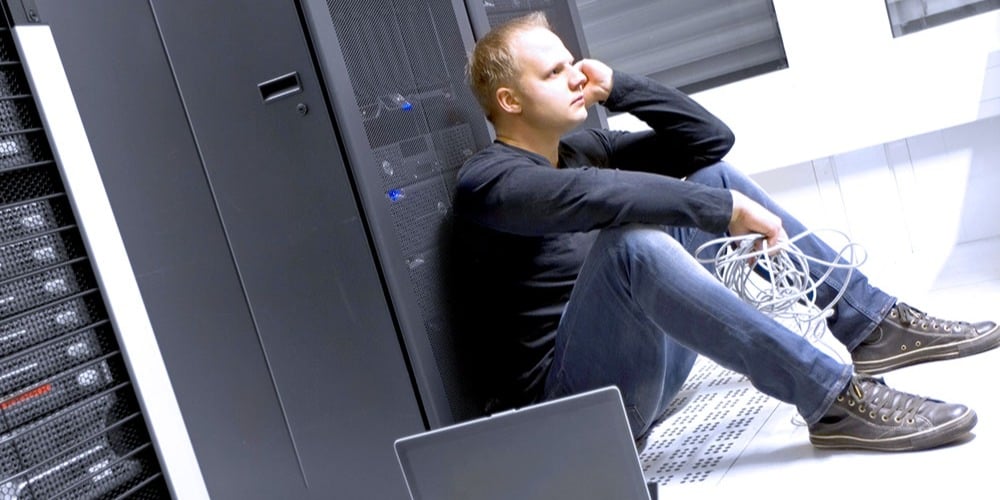 An IT specialist expresses frustration toward his technical issue