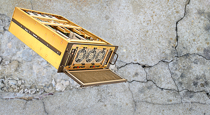Trenton Systems 4U rugged server in front of cracked concrete