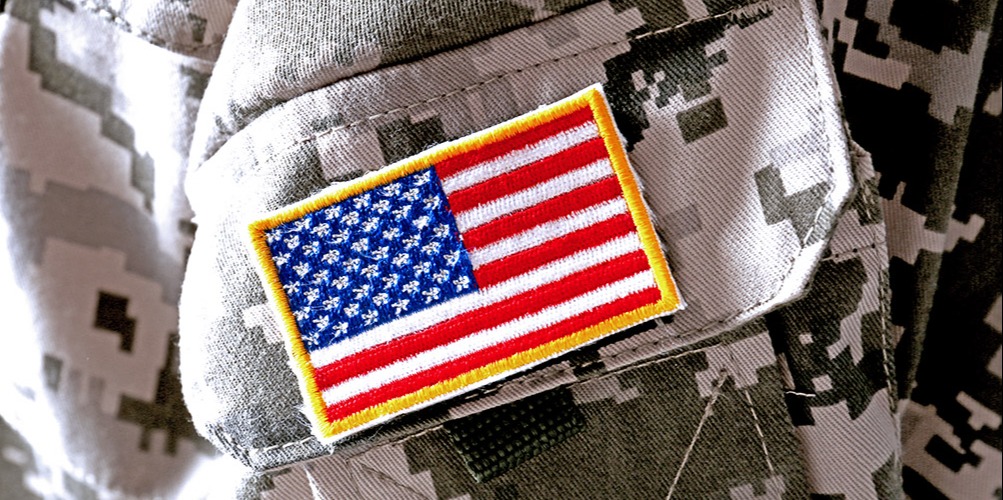 This is a closeup of an American flag stitched onto a U.S. Army uniform