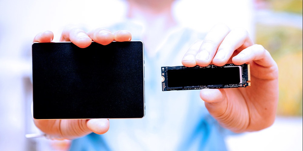 A closeup of the two common NVMe SSD form factors: U.2 (left) and M.2