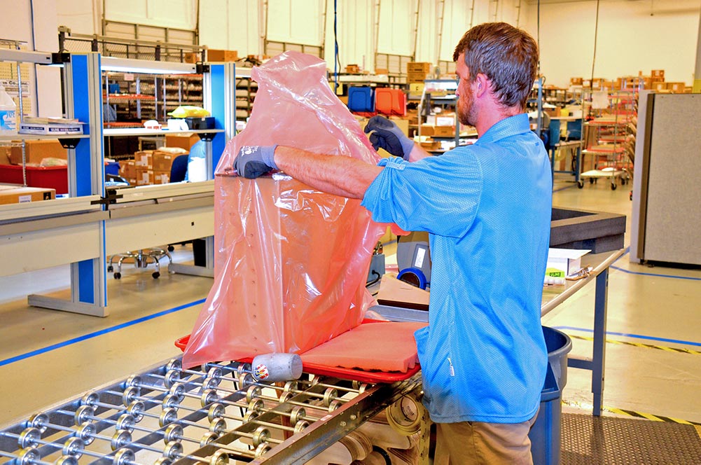 A Trenton Systems employee packages the TMS4711 system