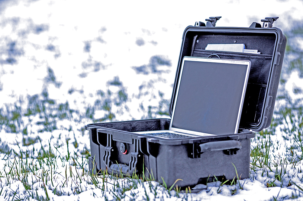 rugged laptop in snow OPT