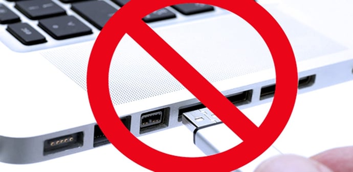 This is a photo of a "no" or "no access" symbol superimposed over a USB port.